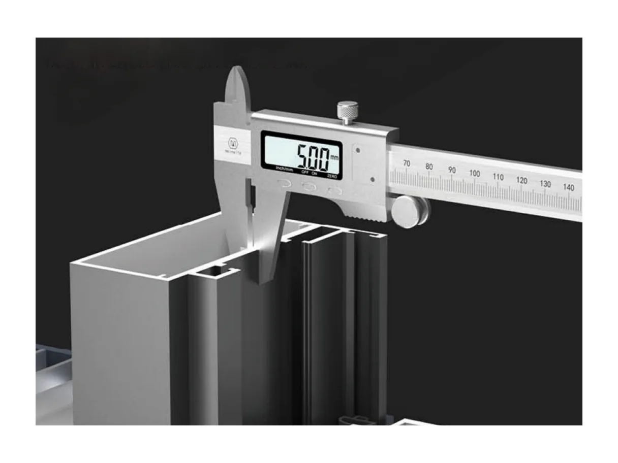 Digital caliper measuring the wall thickness of the cast aluminium profile section