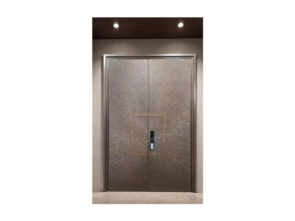 Front view of a bronze carved aluminium entrance leaf with a central circular medallion and a slim lock