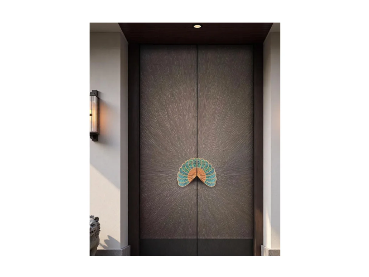 Front view of a bronze aluminium entrance leaf with a fan-shaped brass ornament and black handles