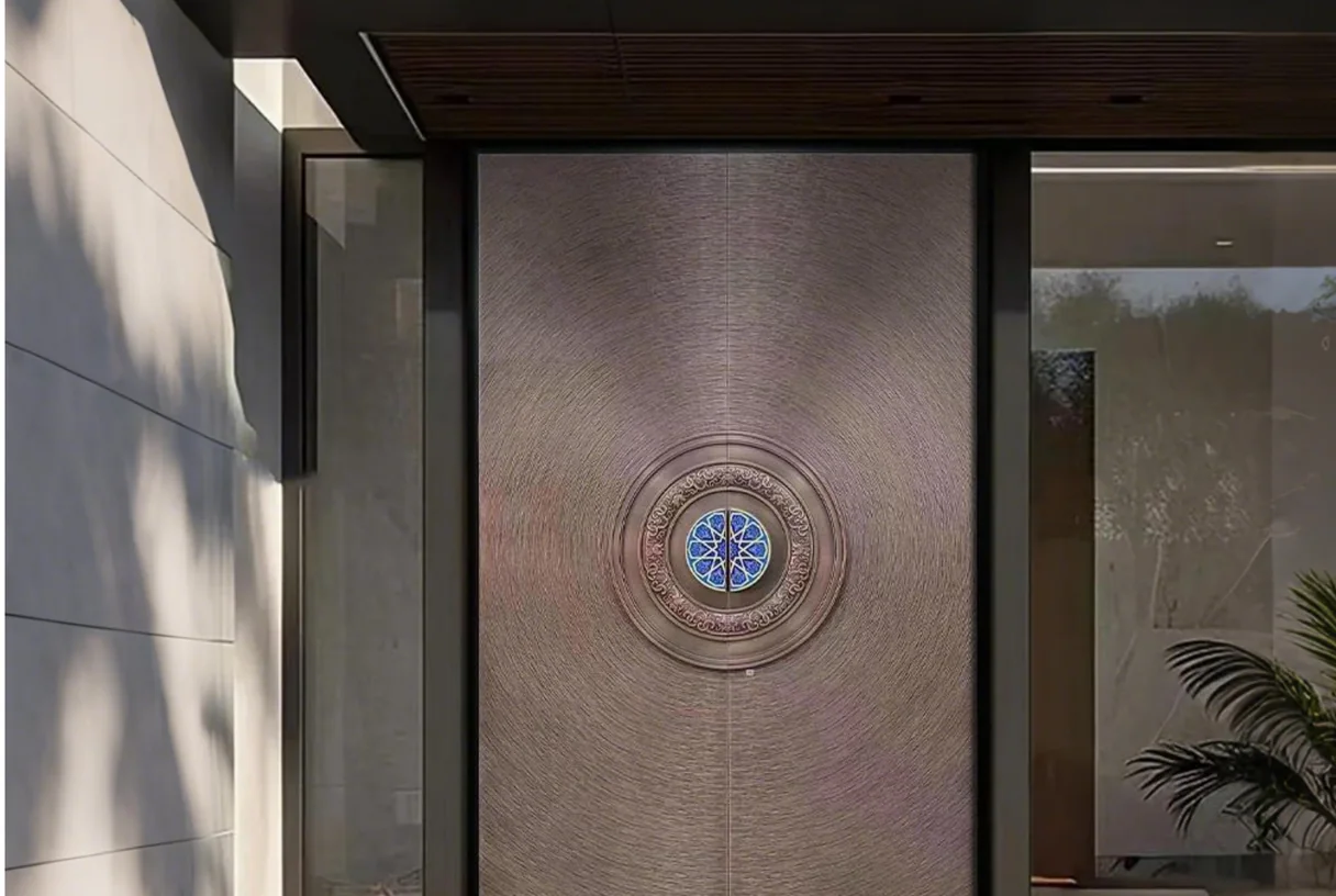 Dark carved aluminium double entrance leaf with a round stained-glass medallion set in marble, design rendering