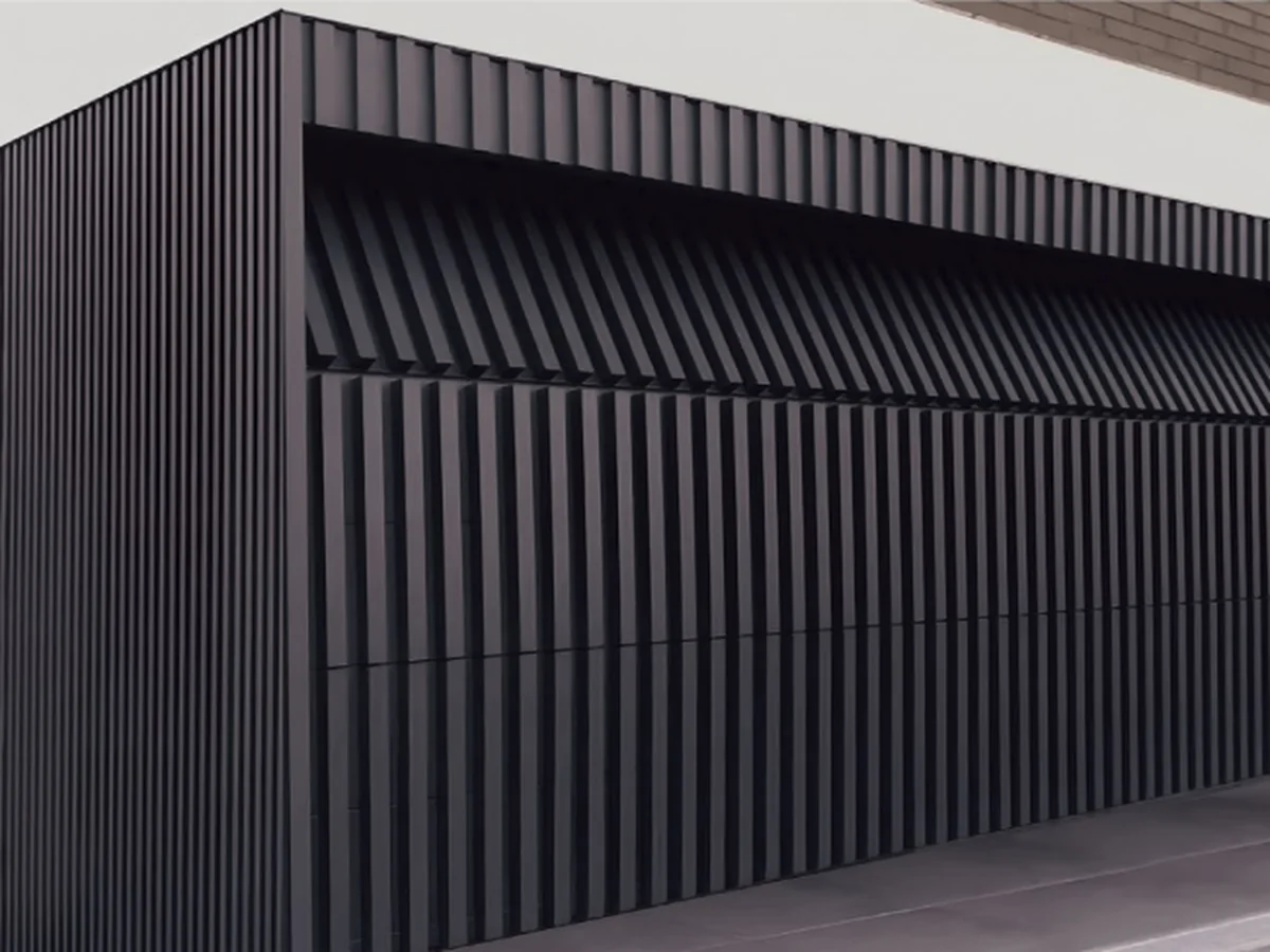 Grey aluminium grille door face showing the batten set and panel joints, design rendering