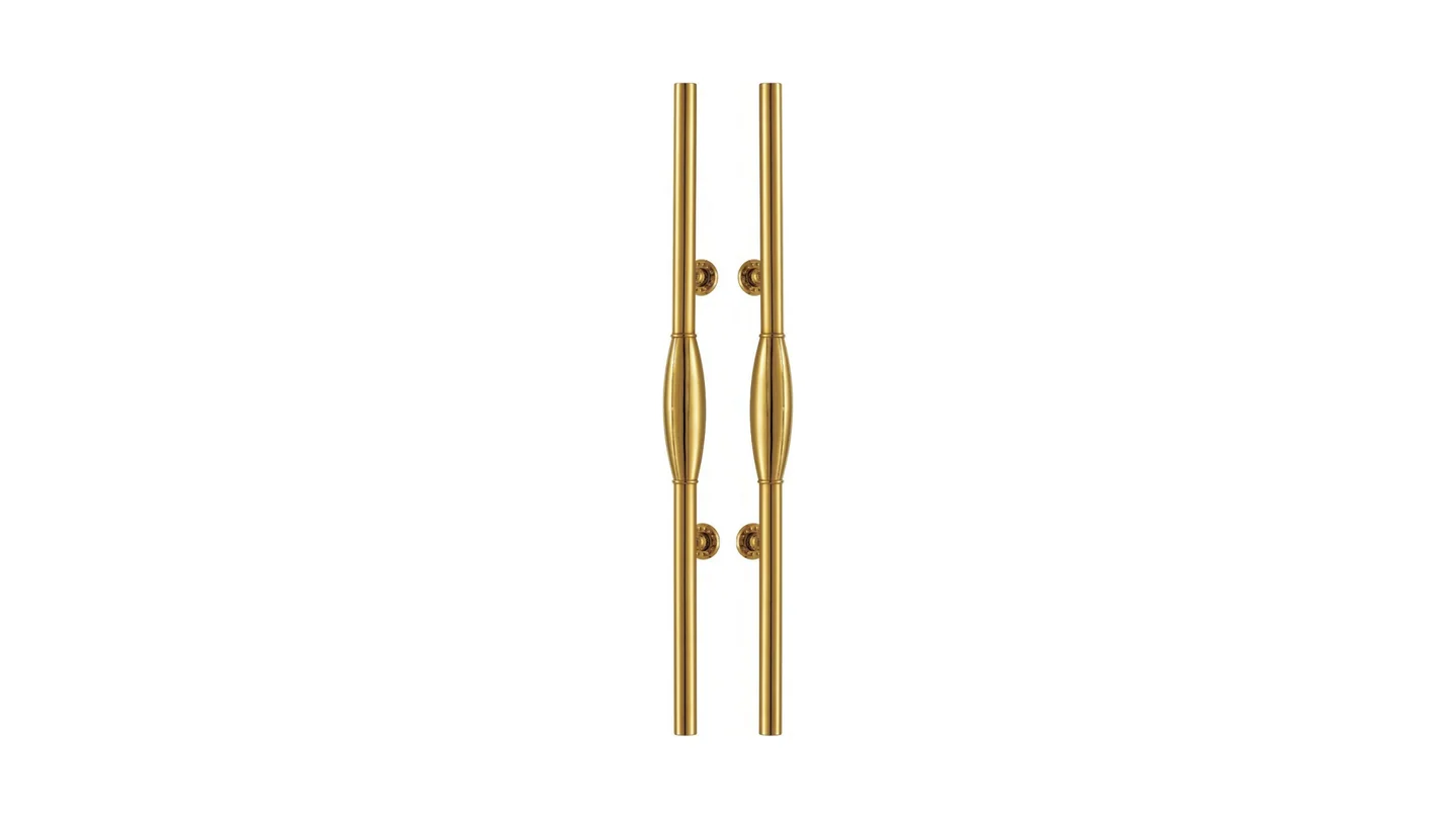 Ornate brass door handle with a carved meander motif on the face, catalogue studio product shot